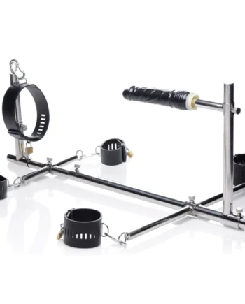 Imprisoned Metal Stockade With Dildo